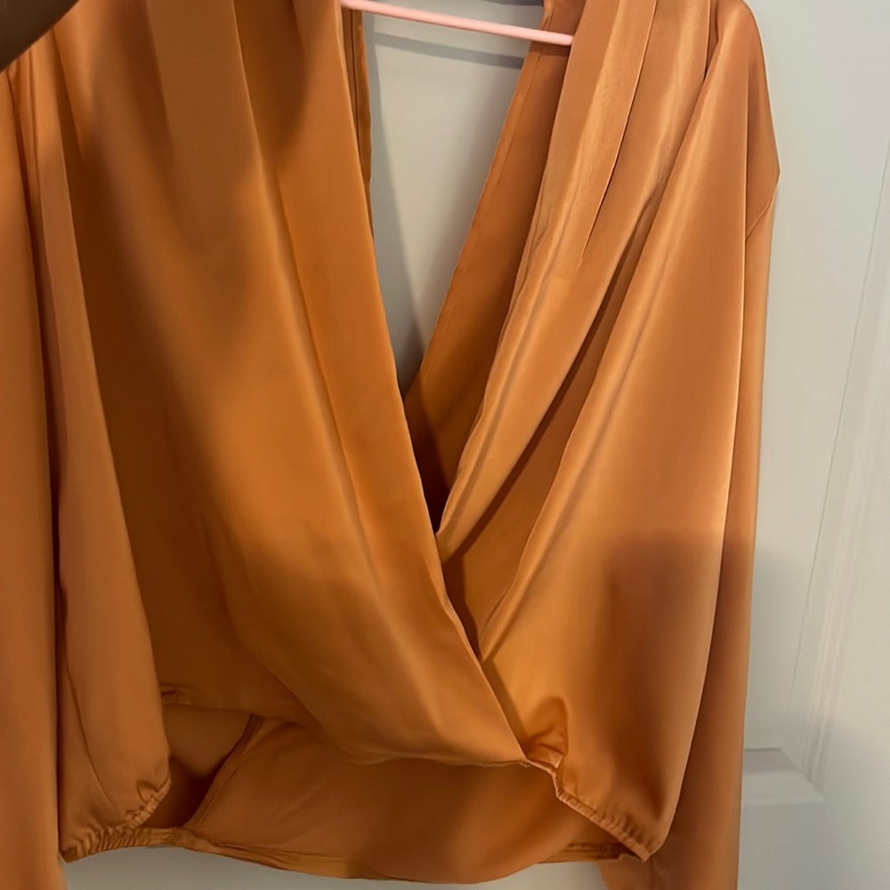 Plunging Neck Twist Hem Split Back Top